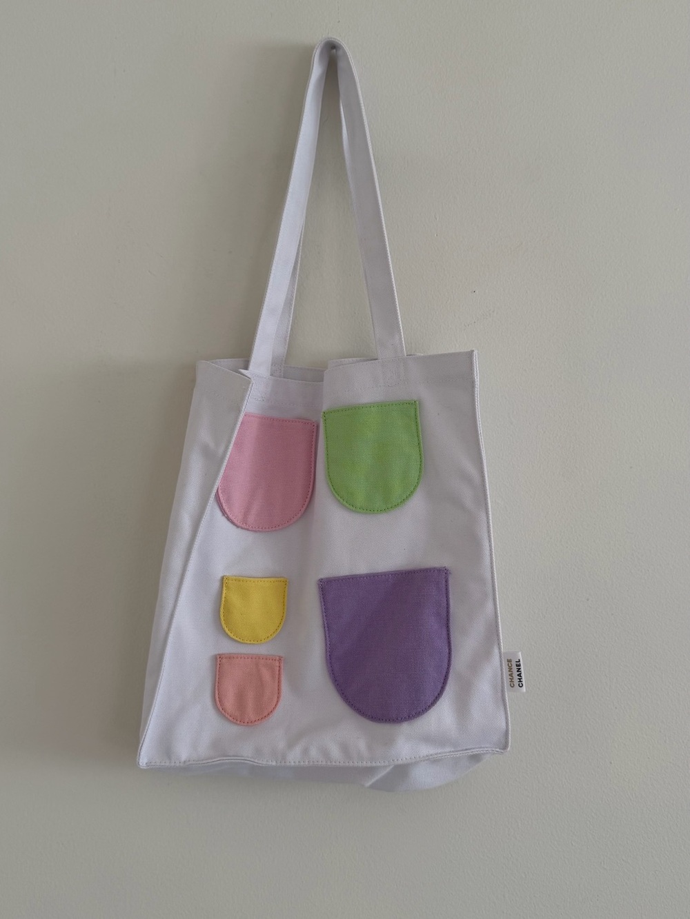White Canvas Tote with Pastel Pocket Accents chanel beauté chance